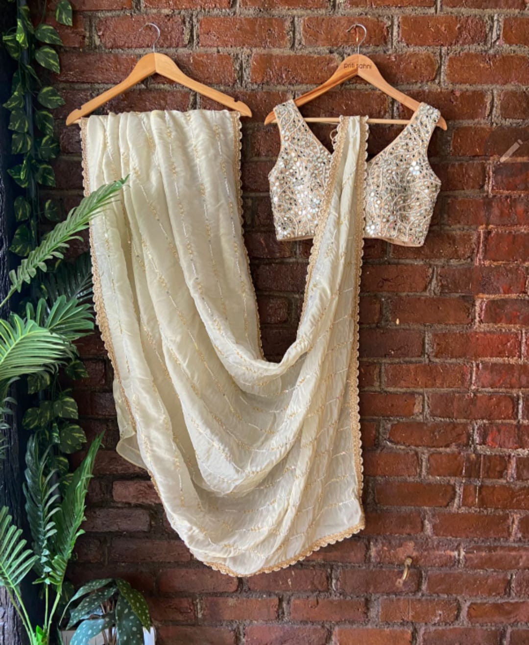 Creme Tissue Embroidered Saree