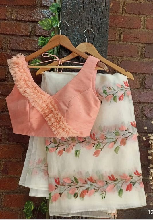 Ivory Hand Painted Saree with a Peach Ruffle Blouse By Priti Sahni
