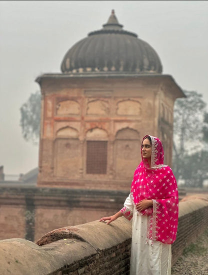 Off white pure silk suit with Fuscia dupatta